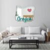 Decorative mirror featuring Oregon and a heart motif.