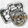 Vintage SLR camera-shaped mirror with classic 35mm design.