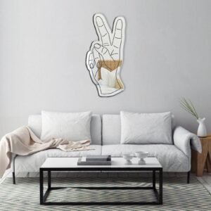 Wall-mounted mirror shaped like a peace sign.