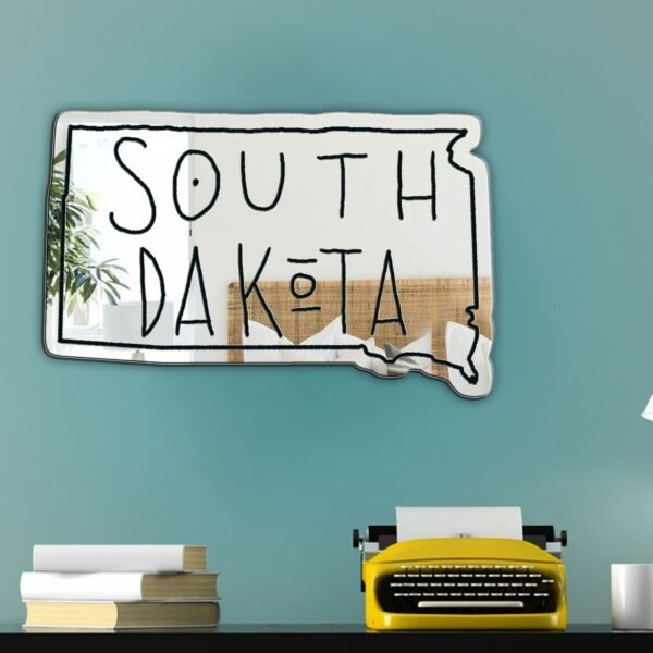 Text 'South Dakota' on white painted mirror.