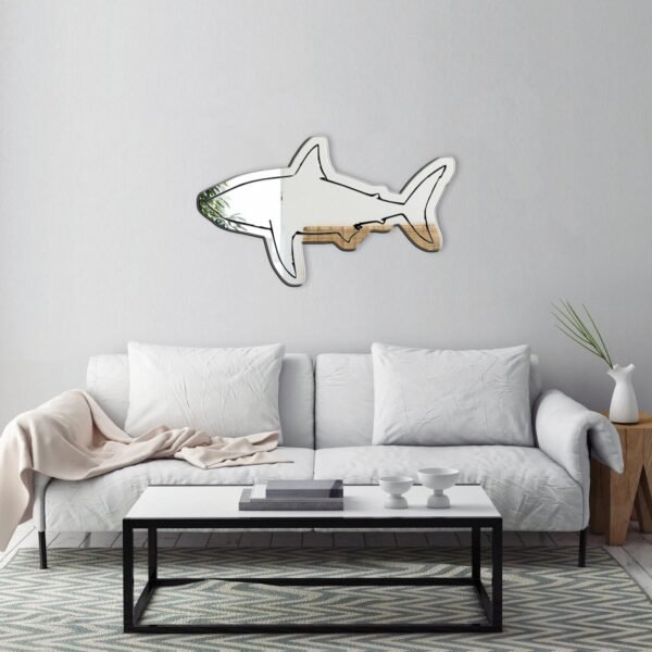 Wall-mounted mirror in the shape of a shark.