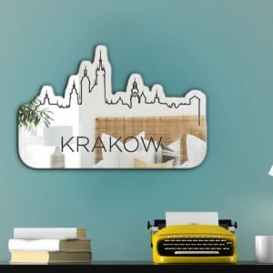 Irregular-shaped mirror reflecting Krakow cityscape.