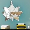 Lotus-inspired irregular shaped minimal mirror.