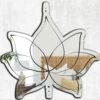 Minimalist mirror with an irregular lotus shape.