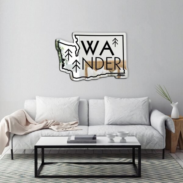 Asymmetrical black mirror with 'Wander Washington' engraving.