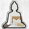 Irregular-shaped mirror with Buddha etched design.
