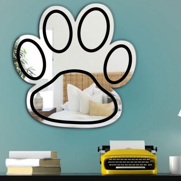 Mirror with a black paw design on white.