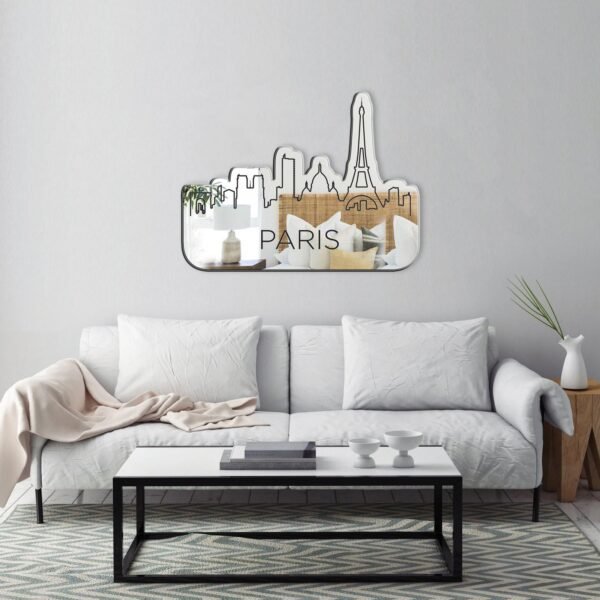 Decorative mirror with abstract Paris cityscape outline.