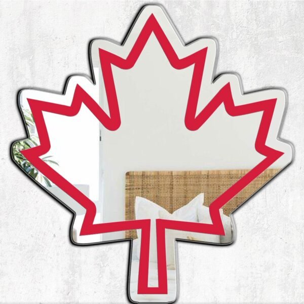 Decorative maple leaf mirror with Canadian motif.