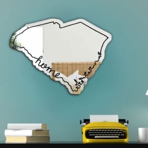 Decorative mirror shaped like South Carolina with artistic details.