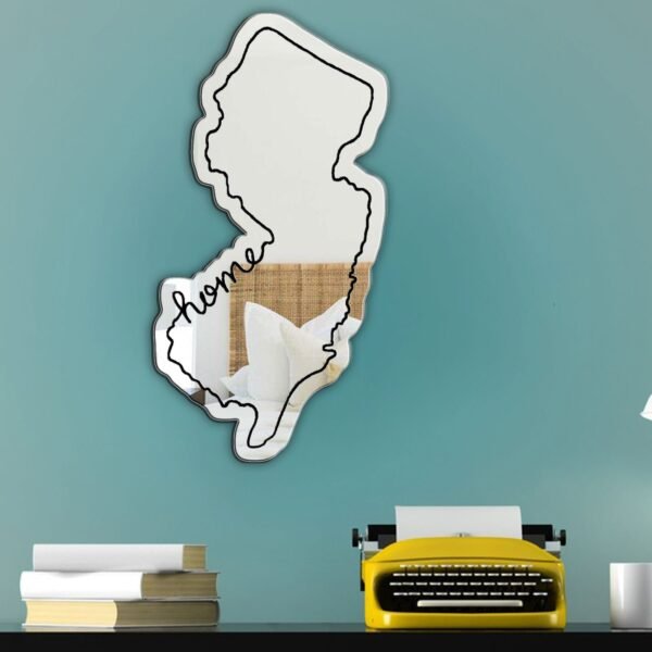 Wall mirror in the outline of New Jersey with reflective surface.