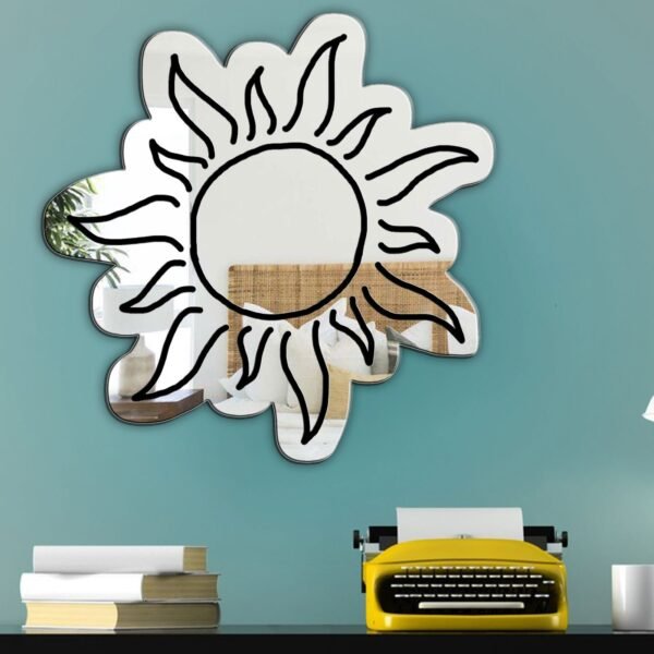 Decorative sun-shaped mirror with a metallic finish.