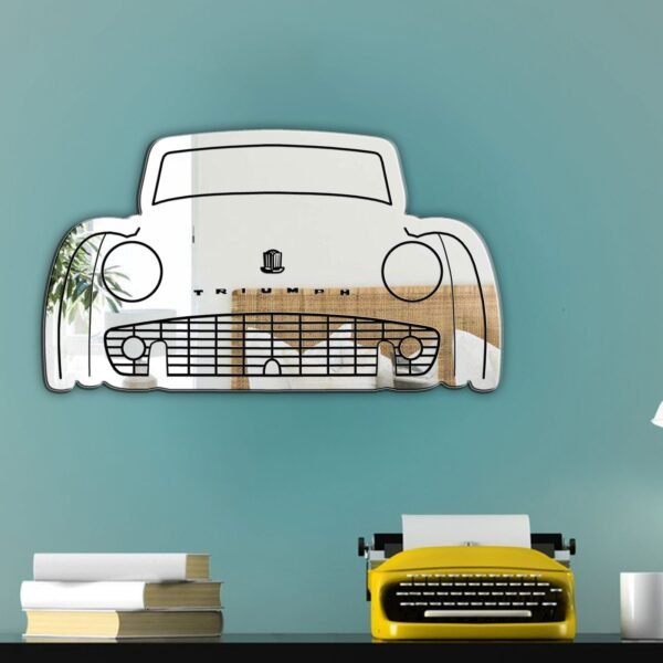 Black Triumph TR3 car graphic on a mirror.