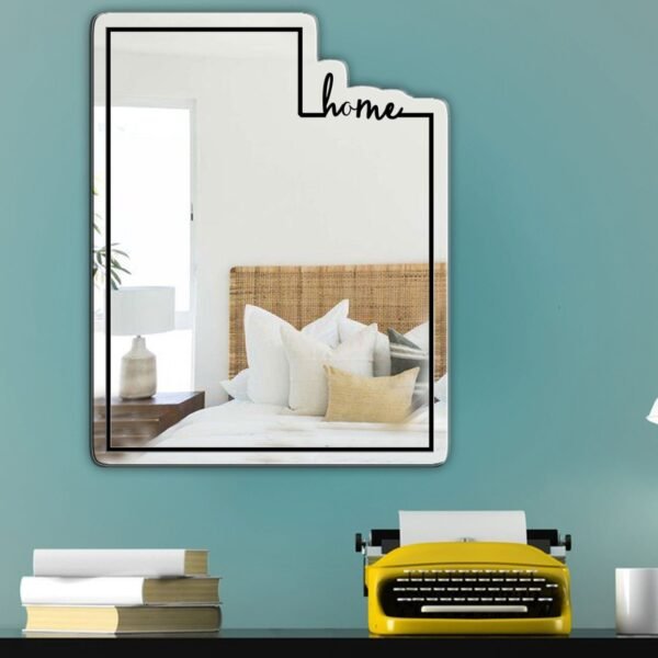 Decorative mirror with 'Utah Home' text in cursive.