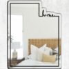 Wall mirror featuring engraved 'Utah Home' script.