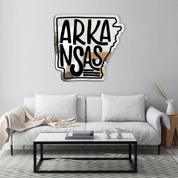 Reflective Arkansas state outline mirror in modern style.