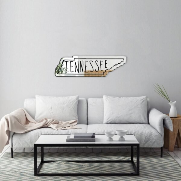 Elegant 'Tennessee' script atop reflective white motifs.