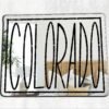Round mirror featuring engraved Colorado State logo.