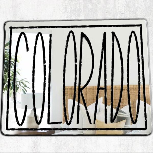 Round mirror featuring engraved Colorado State logo.