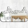 Decorative mirror featuring Ottawa cityscape outline.