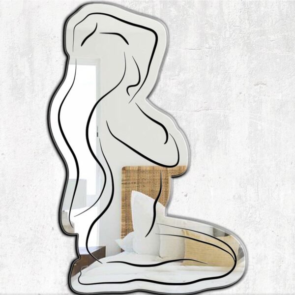 Abstract line art of a woman's face on the Vera mirror.