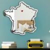 Heart-shaped mirror featuring iconic scenes from Paris