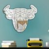 Wall-mounted mirror with a bold and artistic bull silhouette design.