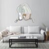Minimalist female face wall-mounted mirror featuring modern line art design.