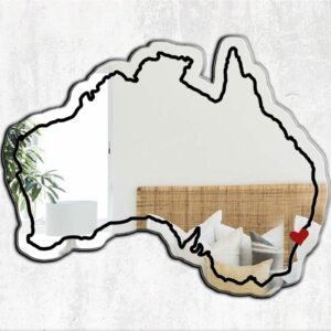 Decorative mirror shaped like Australia with a heart over Sydney.