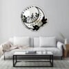 Wall-mounted mirror shaped like a crescent moon.