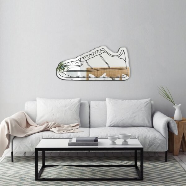 Minimalist white sneakers illustration on a mirror.