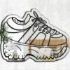A black and white artistic depiction of a Platform Sneaker, representing the iconic athletic shoe style of the 90s and Y2K era, popularized by groups like the Spice Girls.