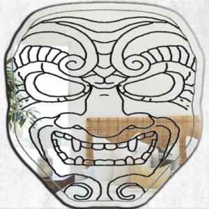 A highly detailed and artistic samurai mask design featured on a mirror surface.