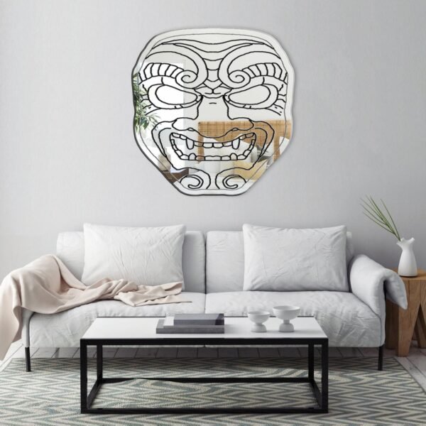 A bold and detailed samurai mask design in an artistic mirror format.