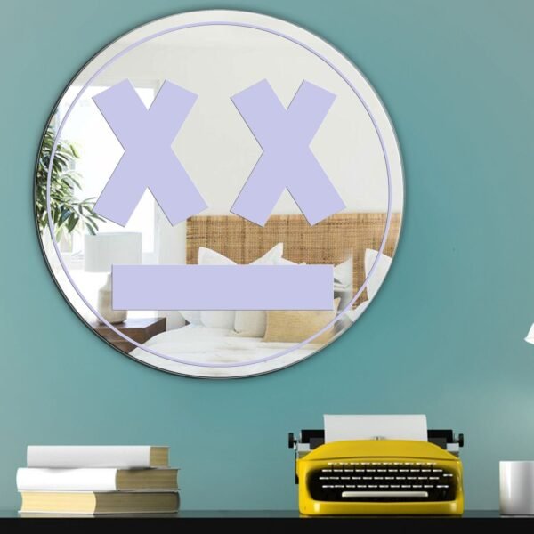 Circular mirror featuring a purple "Game Over" face with artistic design.