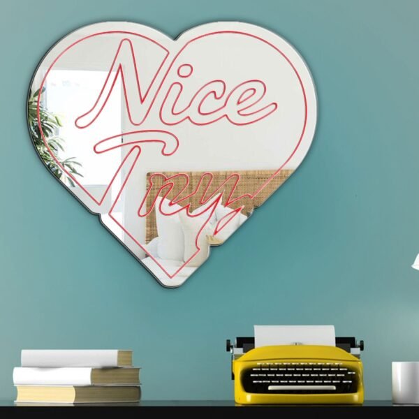 NICE TRY HEART Mirror featuring bold text and a heart design.