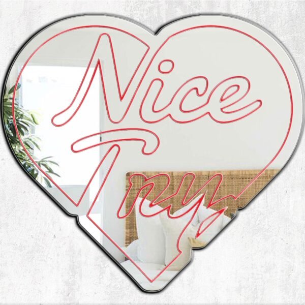 NICE TRY HEART Mirror featuring bold text and a heart design.