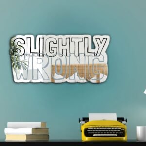 A mirror featuring the humorous quote "slightly wrong" in bold, artistic black typography.