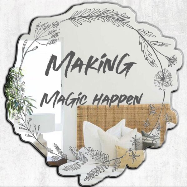 Hand-painted mirror with floral wreath design and "Making Magic Happen" text.