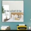 A stylish mirror with the motivational quote "It is what it is" displayed in bold, minimalist typography.