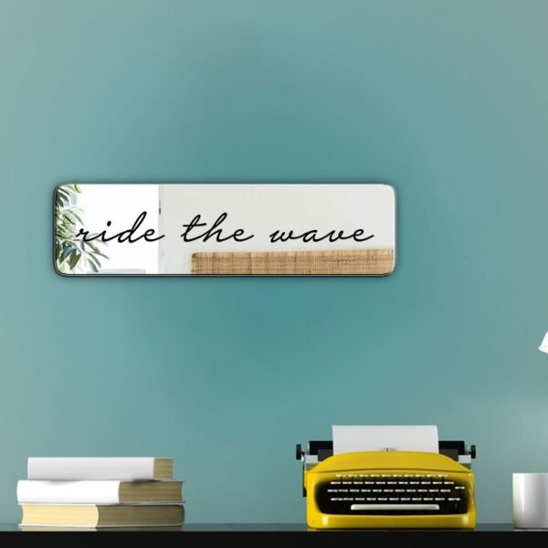 "Ride the Wave" in cursive, simple black custom-painted mirror design.