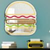 Minimalist burger illustration on a mirror.