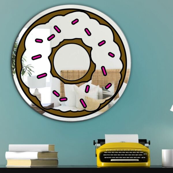 A mirror featuring a donut design with pink sprinkles.