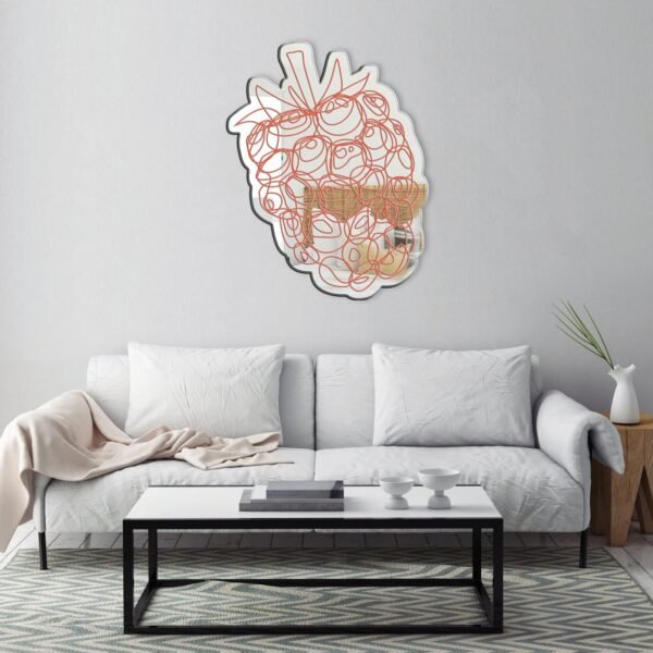 Vintage raspberry fruit illustration on a mirror with contemporary design.