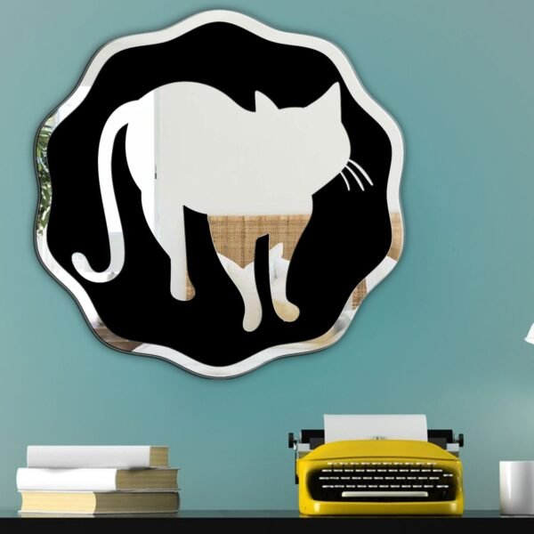 Cat-shaped mirror with reflective glass and black frame.