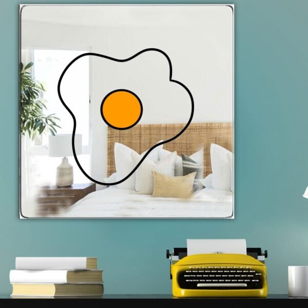 A mirror featuring an illustration of a fried egg with a vibrant yellow yolk and soft white egg white.