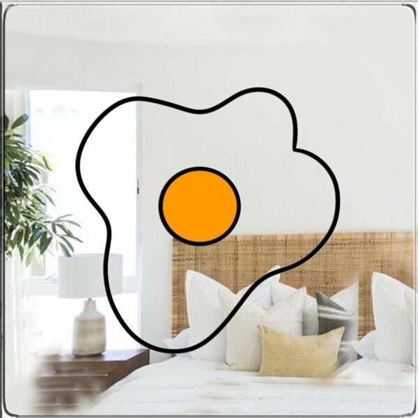 A mirror with an illustration of a fried egg, showing a bright yellow yolk surrounded by white egg whites.