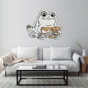 Cartoon frog-shaped mirror with doodle designs.