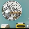 A mirror with a stylish printed design of mountains, featuring bold, artistic lines and a modern interpretation of natural landscapes.