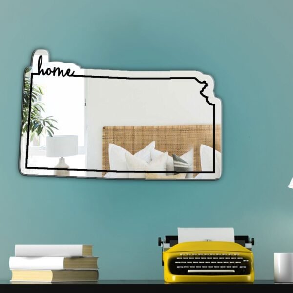 Decorative mirror featuring 'Kansas Home' script.